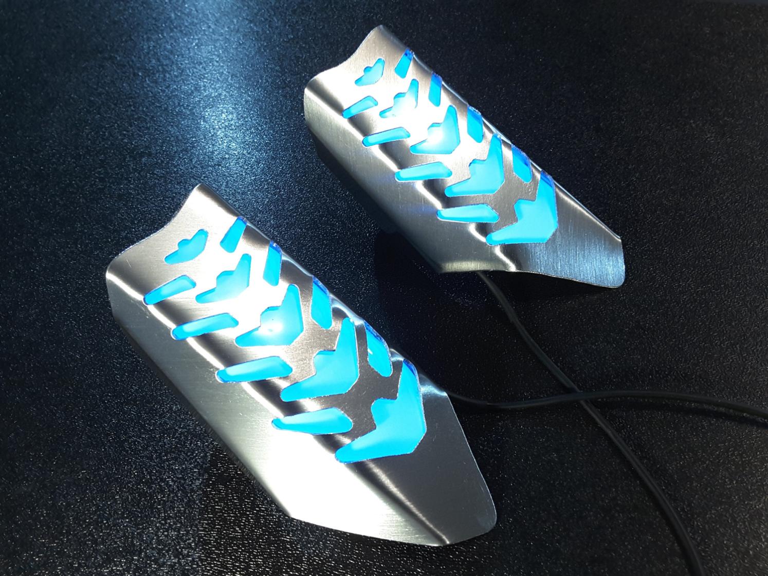 glowing metal wrist guard bracer